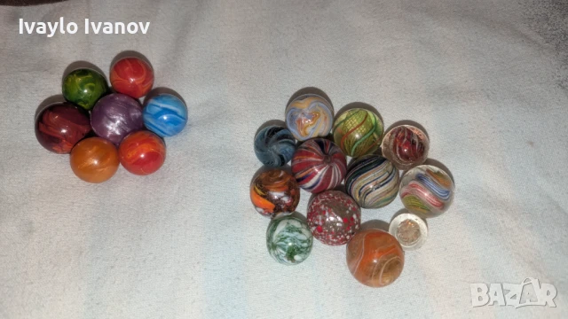 Купувам стари стъклени топчета.