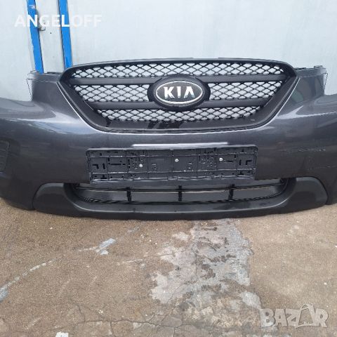 Предна броня за Kia Carens 2009, снимка 1 - Части - 46657174