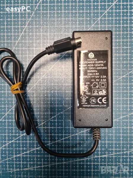 Оригинален захранващ адаптер HONQR ADS-1234TA 12V 5V , снимка 1