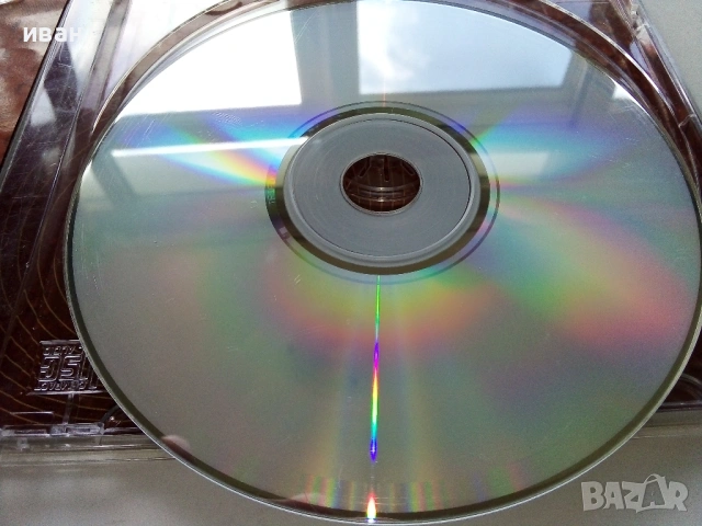 CD  Слави Трифонов и Куку Бенд "...и оркестъра да свири " - 2004г., снимка 4 - CD дискове - 53694102