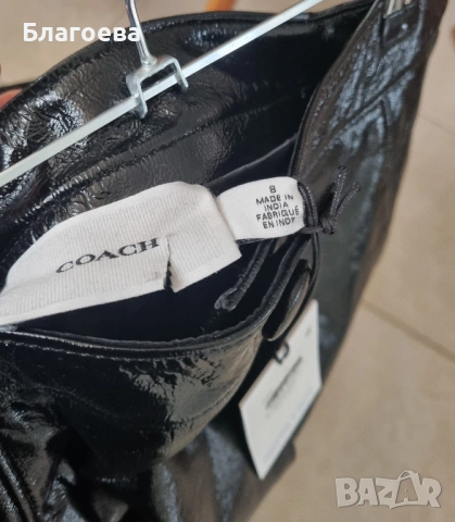 черна лачена къса кожена пола Coach, снимка 5 - Поли - 53632223