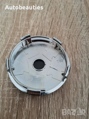 сребристи капачки за джанти за Dacia 60 мм, снимка 2 - Аксесоари и консумативи - 53232486