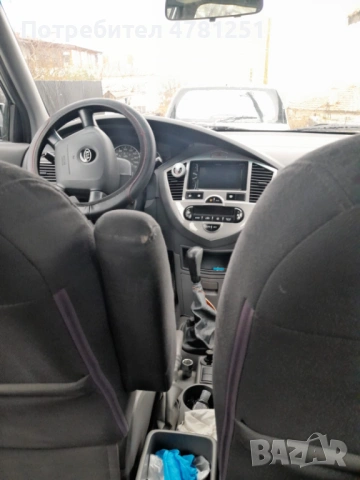 Kia Carens 2.0 CRDI, снимка 7 - Автомобили и джипове - 54015079