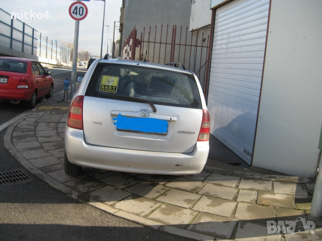 тойота корола 2,0d-4d e12 комби , снимка 10 - Автомобили и джипове - 52598823