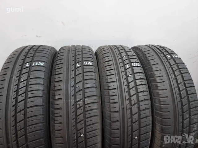 4бр летни гуми 165/65/15 DUNLOP L01378 , снимка 5 - Гуми и джанти - 46897619