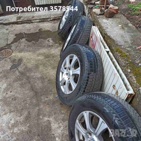 Гуми с джанти Нисан 215/70/16, снимка 2 - Гуми и джанти - 53666180