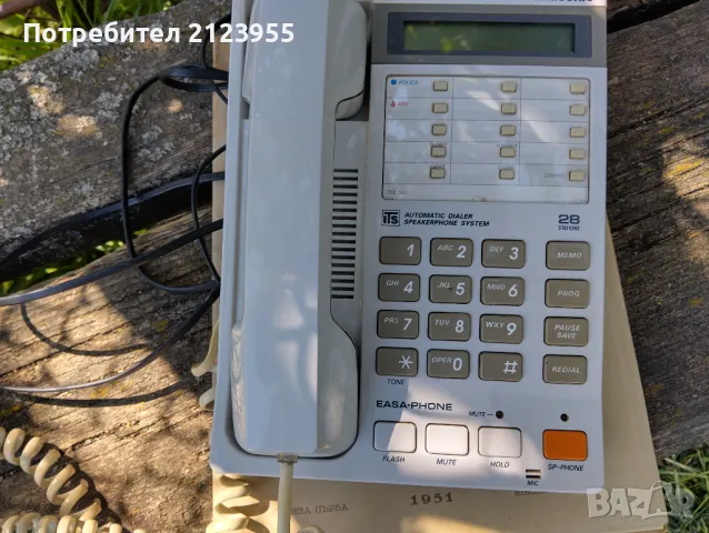 Стационарен телефон.